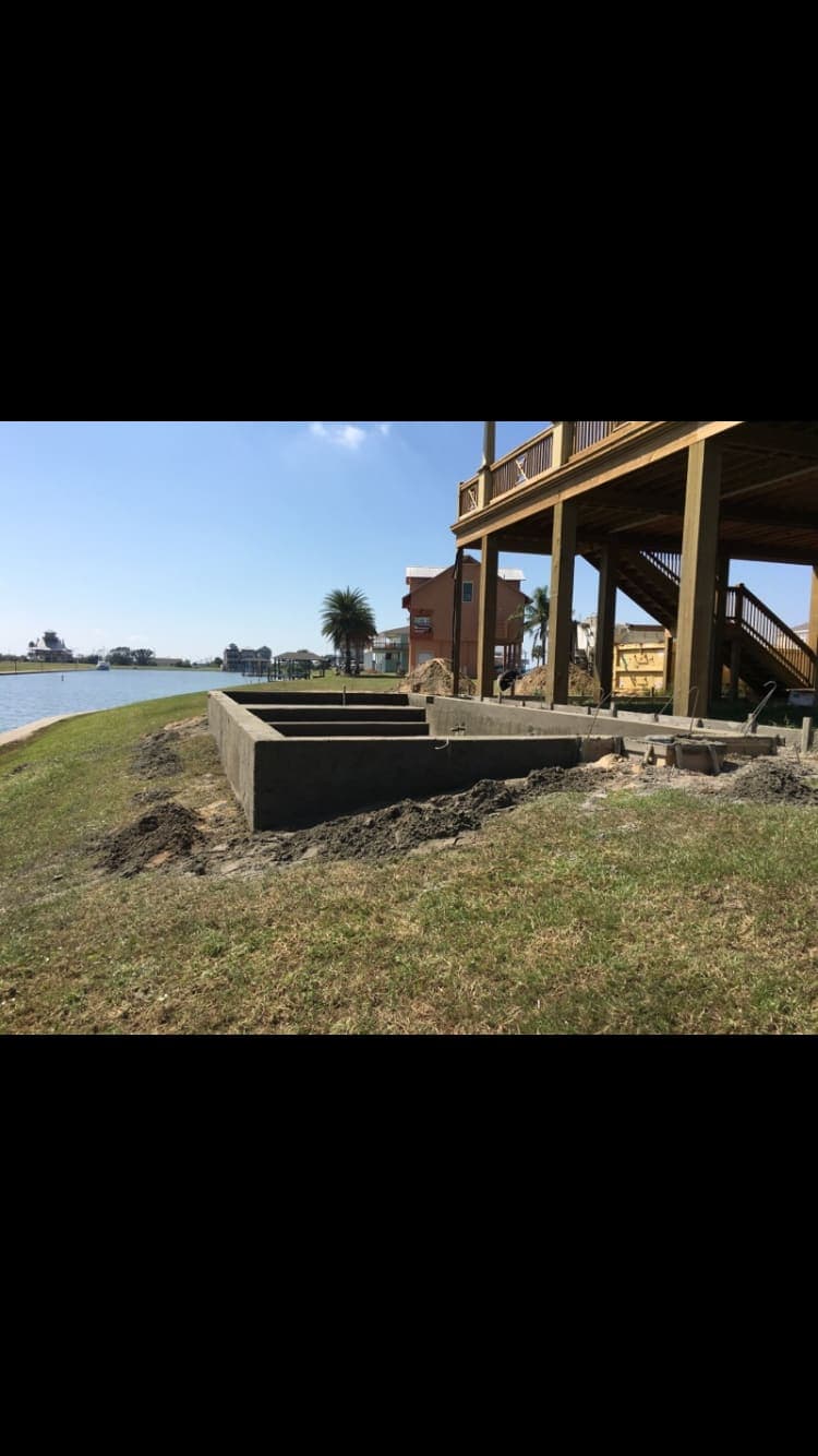 Concrete retaining wall on a waterfront property